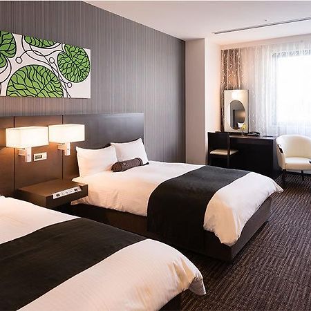 Osaka Airterminal Hotel Toyonaka Eksteriør bilde